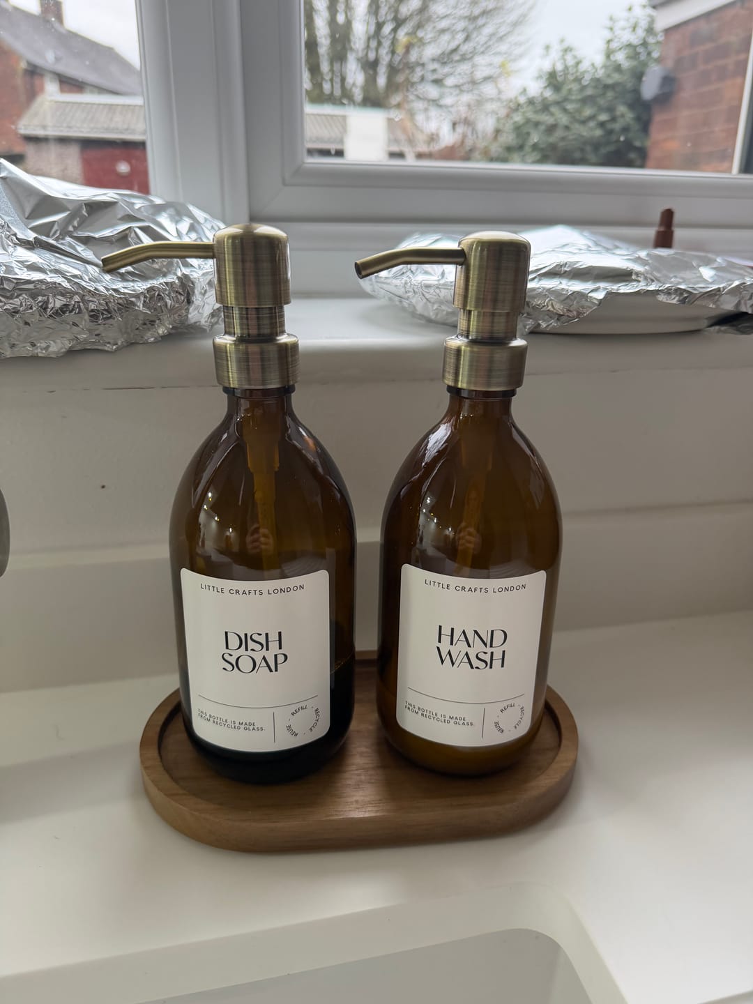 Customer photo review of Set of 2 Amber Glass Bottle 500 ML with Metal Pump & Small Tray