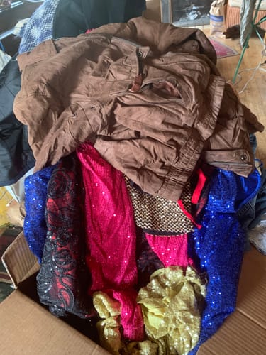 Customer's view inside a box containing the Wholesale Women's Sequin Mix with colorful sequined pieces.