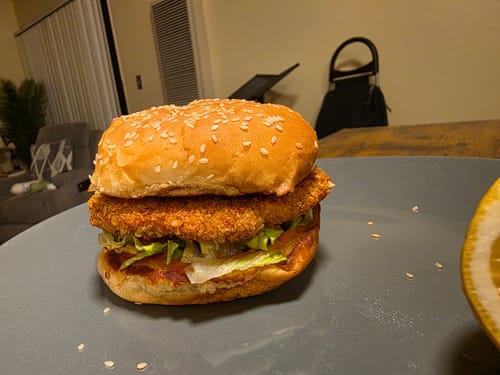 Customer's crispy sandwich made with the Halal Chicken Breast on a sesame seed bun.