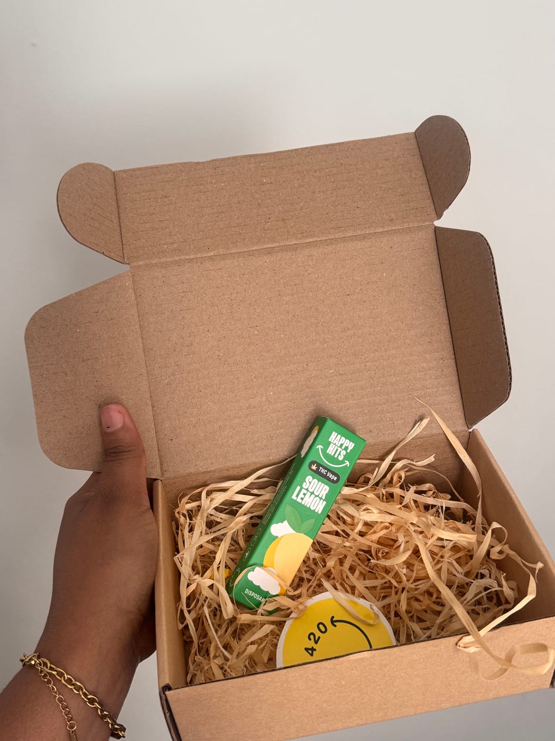Customer photo review of Happy Hits Disposable THC Vape – Sour Lemon