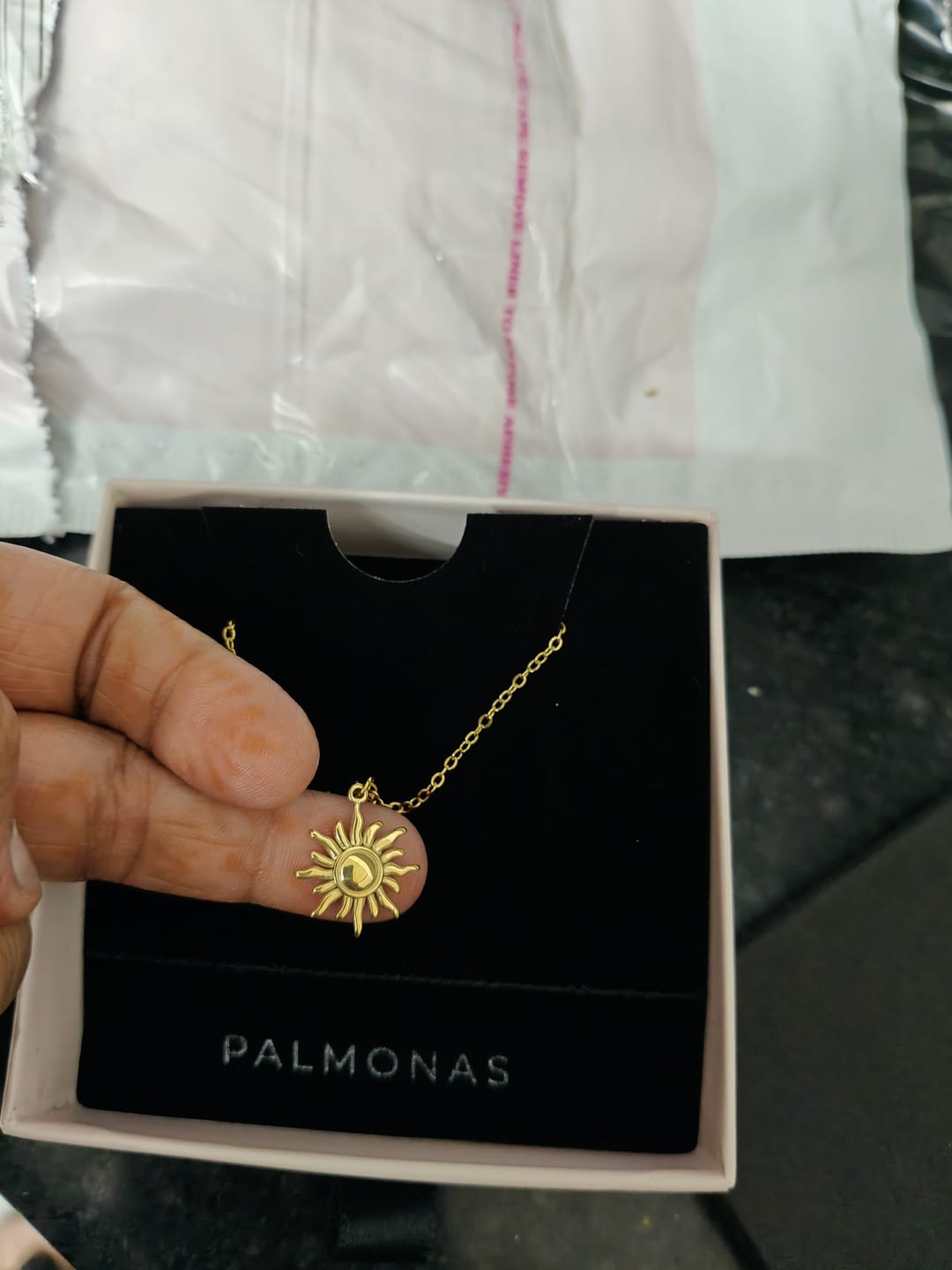 Customer photo review of Glowing Sun Necklace