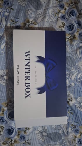 Customer's white and blue 'Winter Box' packaging for the OUD Supreme BUNDLE.