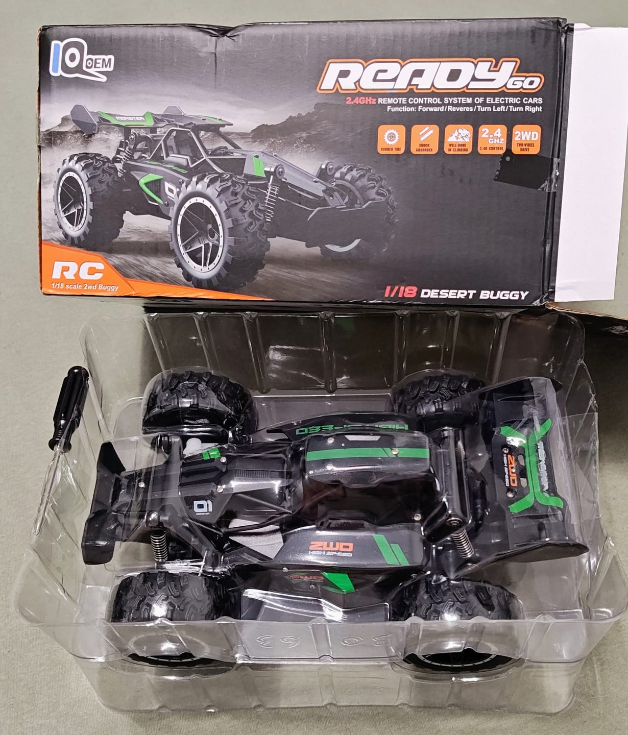 Customer photo review of Masina cu telecomanda Monster RC Truck, Timebox, 2,4Ghz, 25km/h, Offroad, 1 baterie tip acumulator inclusa, 1:18, Tractiune 2WD, Suspensie puternica, jucarie pentru copii 6-14 ani si adulti, Negru/Verde