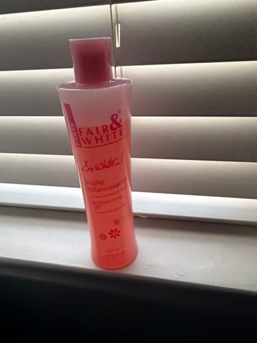 Customer photo review of Fair and White So White Brightening Body Oil with Sweet Almond Oil 250 ml / 8.4 fl oz
