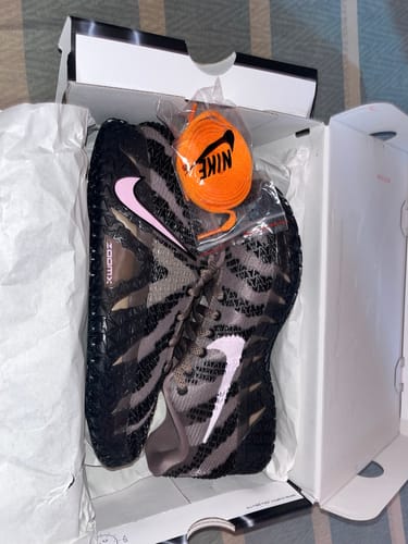 Customer's new Nike Ja 3 "Showstopper" EP Basketball Shoes in the box with a pink swoosh and extra orange laces.