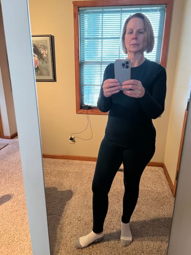 Customer's mirror selfie showing the full-length, dark timber Stella Leggings.