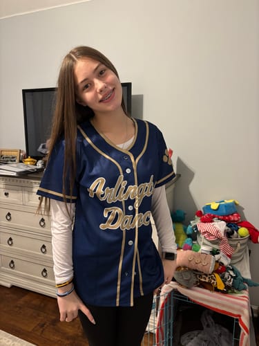 Reviewer wearing the custom navy baseball jersey with cream script and a full-button front.