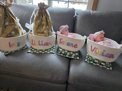 Reviewer's photo shows four personalized baskets used for gifting the Animal Plushie Toy.