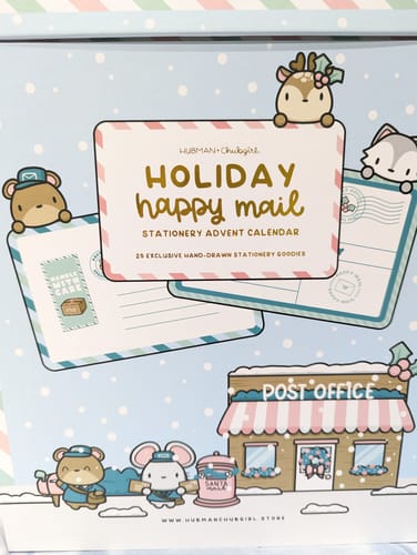 Customer's Holiday Happy Mail Stationery Advent Calendar box with cute, illustrated postal-themed animal characters.
