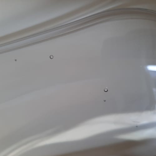 Customer photo review of CARMEN - Lot de 4 chaises transparentes avec pieds en bois et bouclettes blanches
