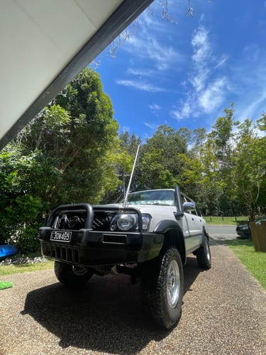 Customer's clean silver 4WD after using the Starter Essentials 4WD Care Package, shown parked in a driveway.