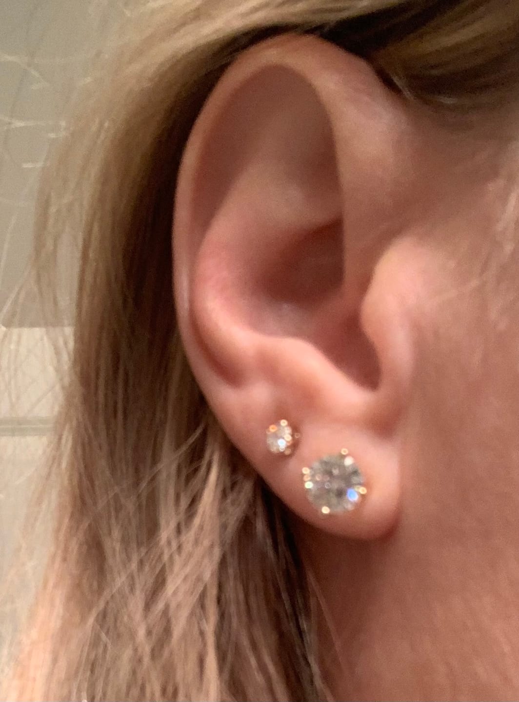 Customer photo review of Round Solitaire Stud Earrings - Moissanites
