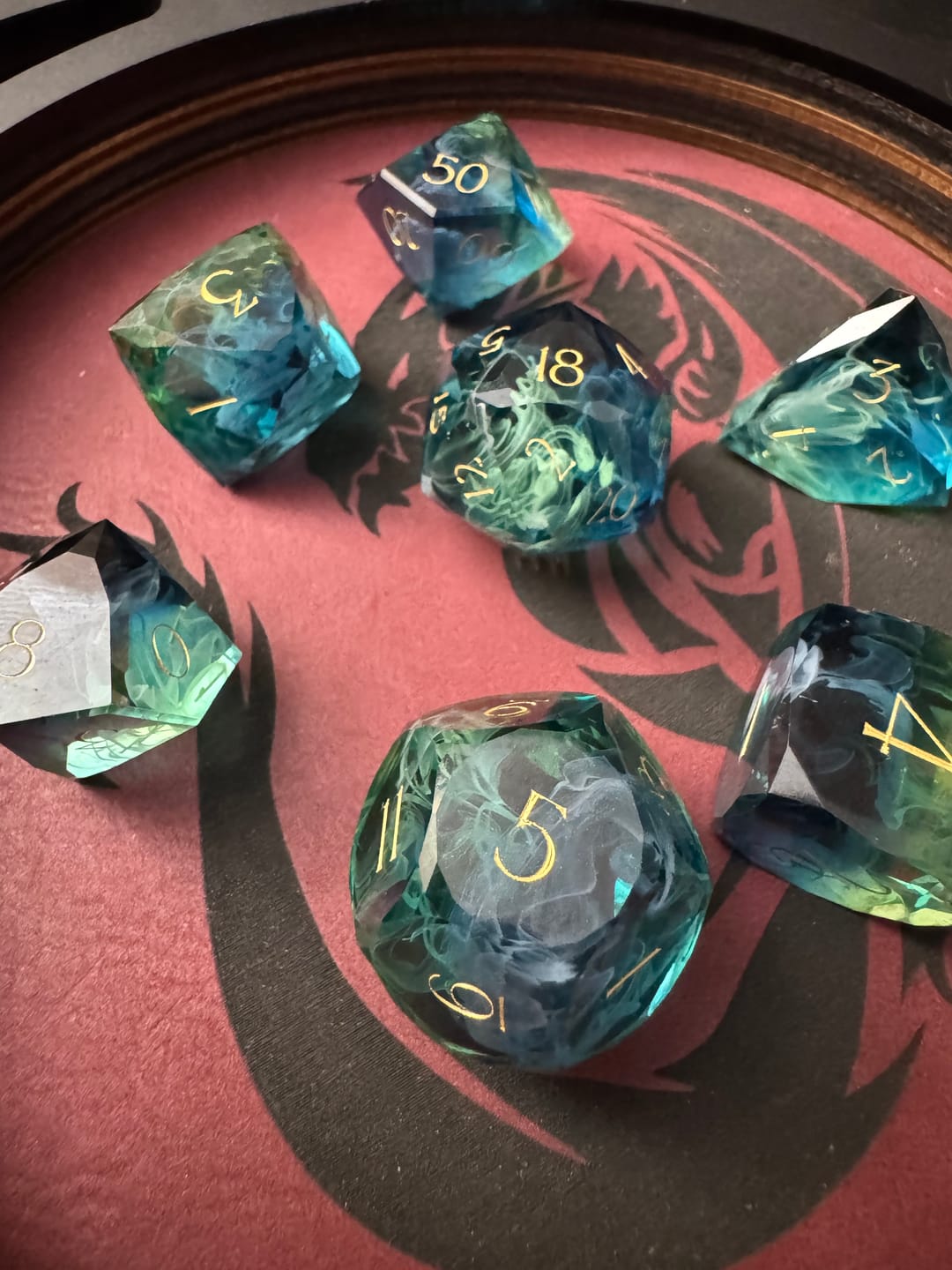 Customer photo review of URWizards D&D Resin Tidebound Fate Engraved Dice Set Multi-faceted Style