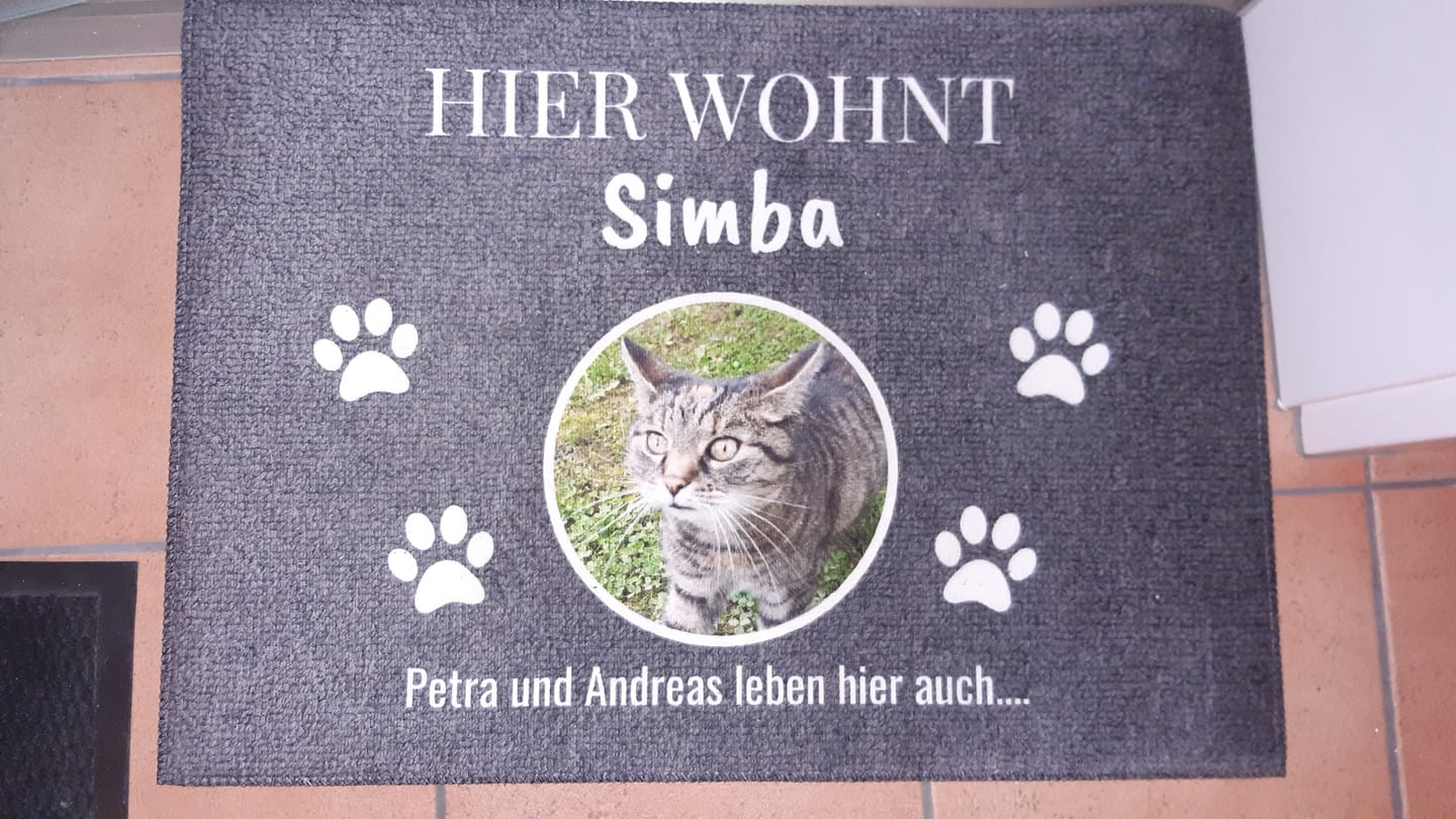 Customer photo review of Hier wohnt - Individuelle Haustier Fußmatte
