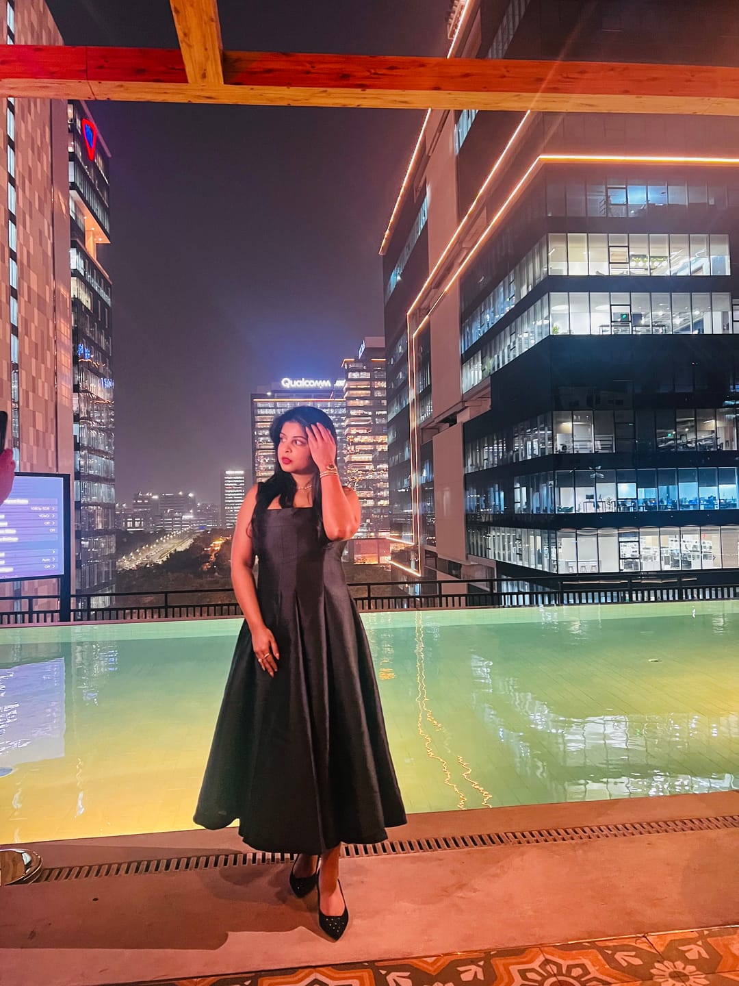 Customer photo review of Rigata Holiday Statement Maxi Dress in Black