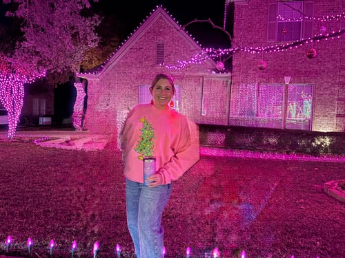 Customer wearing the Judy Blue Wilhemina Wide Leg Jeans in a comfortable, relaxed fit while standing outside at night.