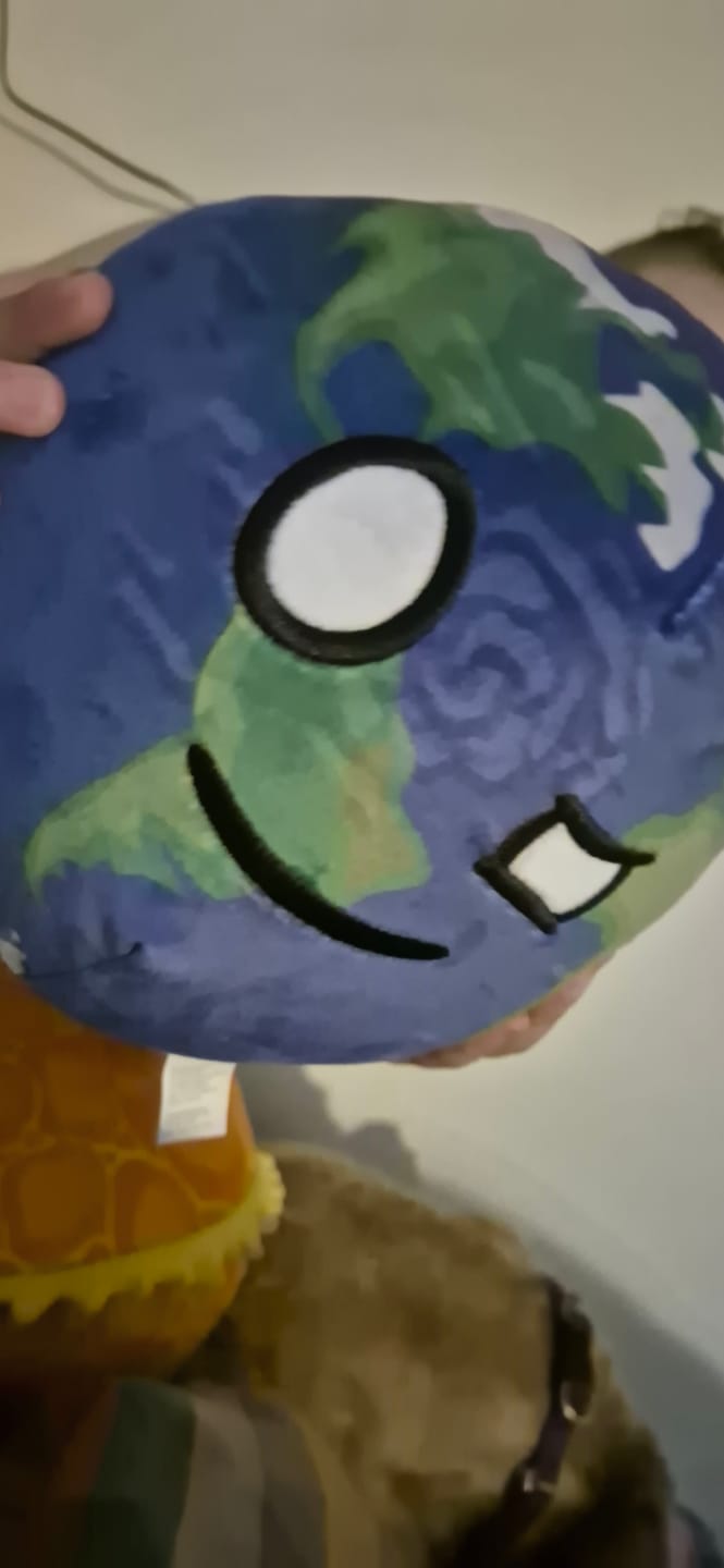 Customer photo review of The SolarBalls Earth Plush