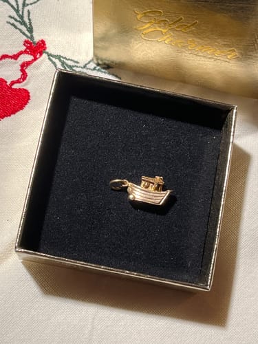 Customer photo review of gold charm