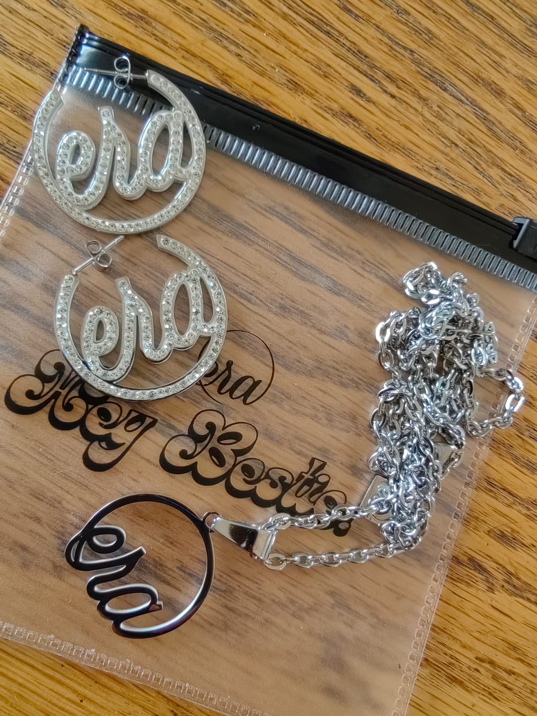 Customer photo review of Silver Luxe Logo Hoops