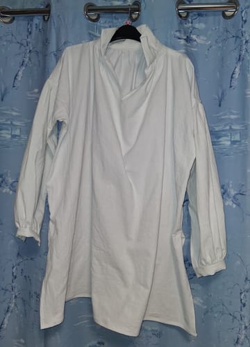 Reviewer's handmade white Regency shirt, made from the Linen Feel Cotton Fabric, hanging on display.