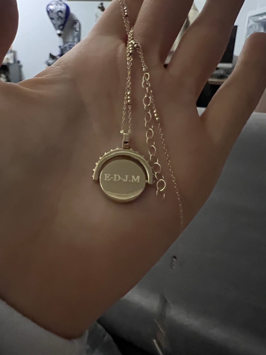 Customer photo review of Engravable Spinning Necklace
