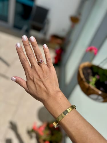 Customer photo review of Bluebird™ Pink Tourmaline & 0.25ct TW Diamond Pear Halo Ring in 9ct Yellow Gold