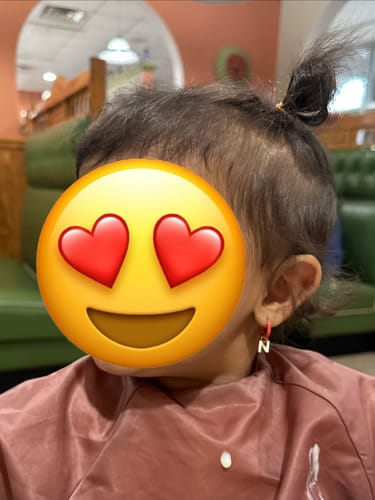 Customer photo review of Colored Huggies Earrings