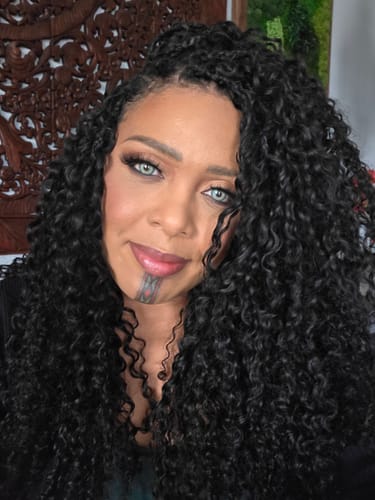 Customer showing the full, long style of their Burmese Water Curly crochet hair.