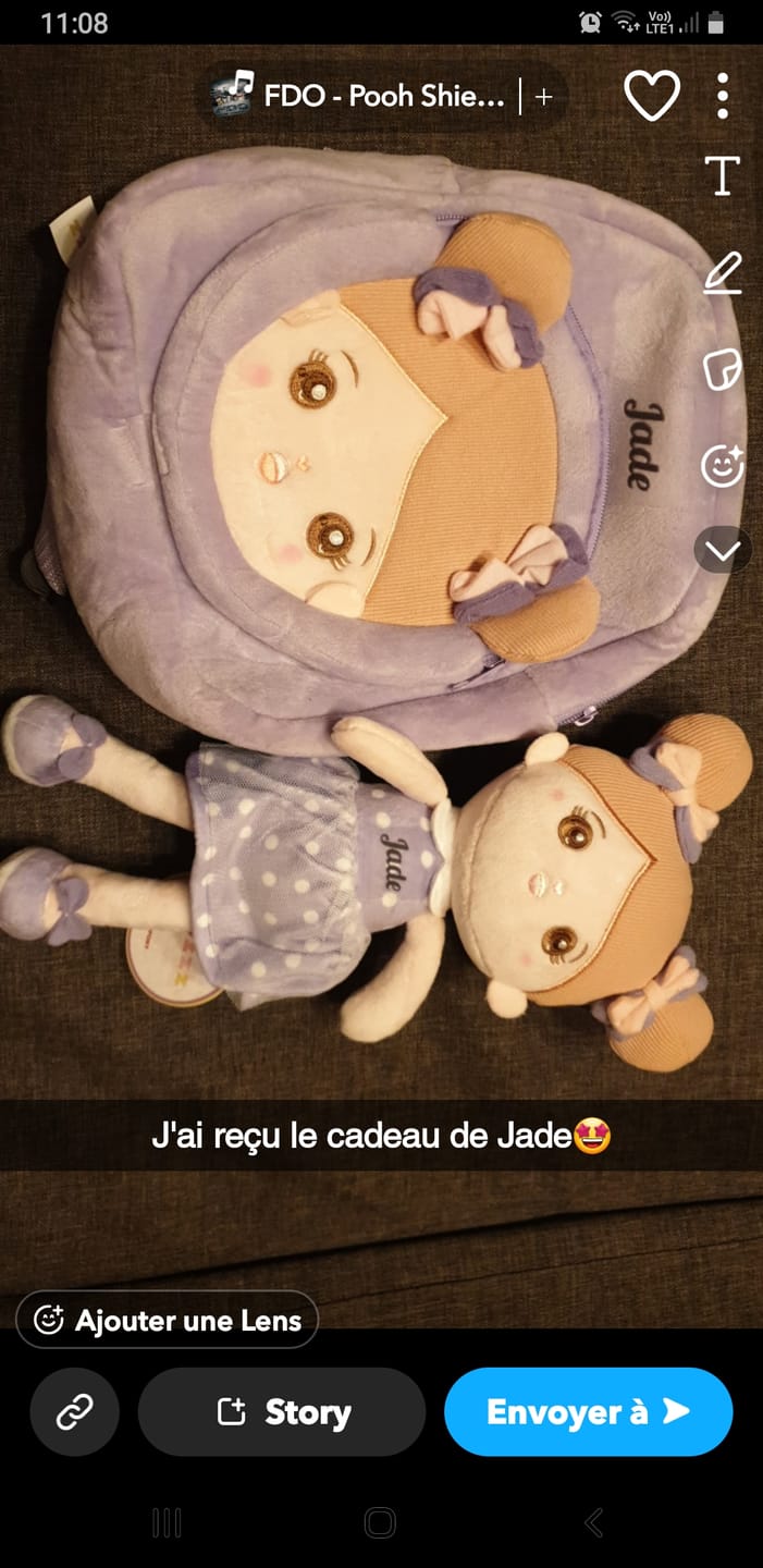 Customer photo review of Personnalisée Poupée en Peluche avec Yeux Ouverts en Robe à Pois Violets