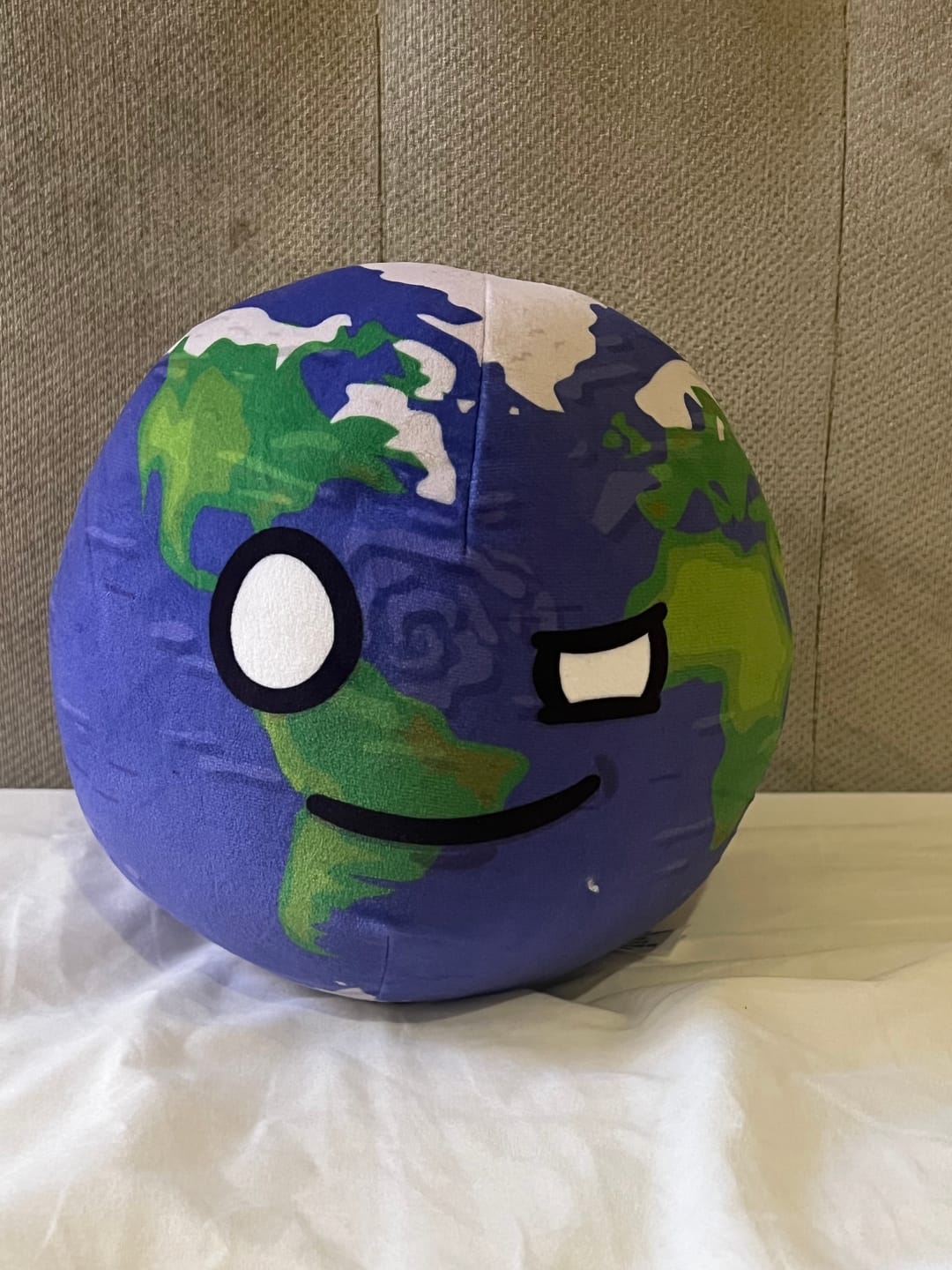 Customer photo review of The SolarBalls Earth Plush