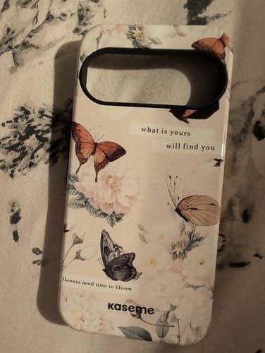 Customer's KaseMe phone case featuring a delicate butterfly and floral design.