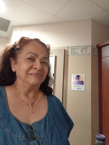 Customer photo review of 14K Solid Gold Sideways Letter Necklace