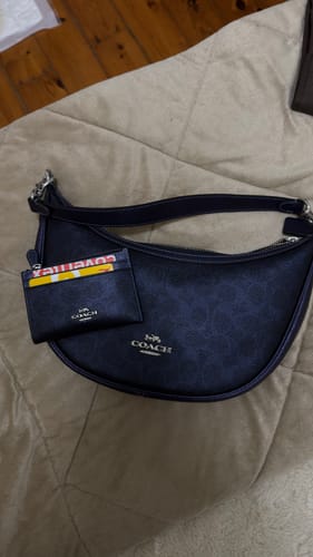 Customer photo review of Aria Shoulder Bag In Signature Canvas (Sv/Blue/Navy)