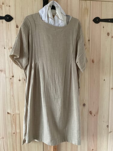 Customer's finished dress made from the plain beige double gauze fabric, showing the front.