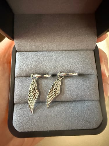 Customer photo review of The Hope® - 925 Sterling Silver Hoop Dangle Angel Wing Earrings