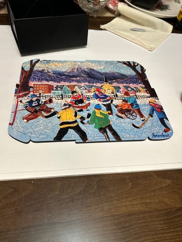 Customer photo review of Hometown Showdown Wood Jigsaw Puzzle