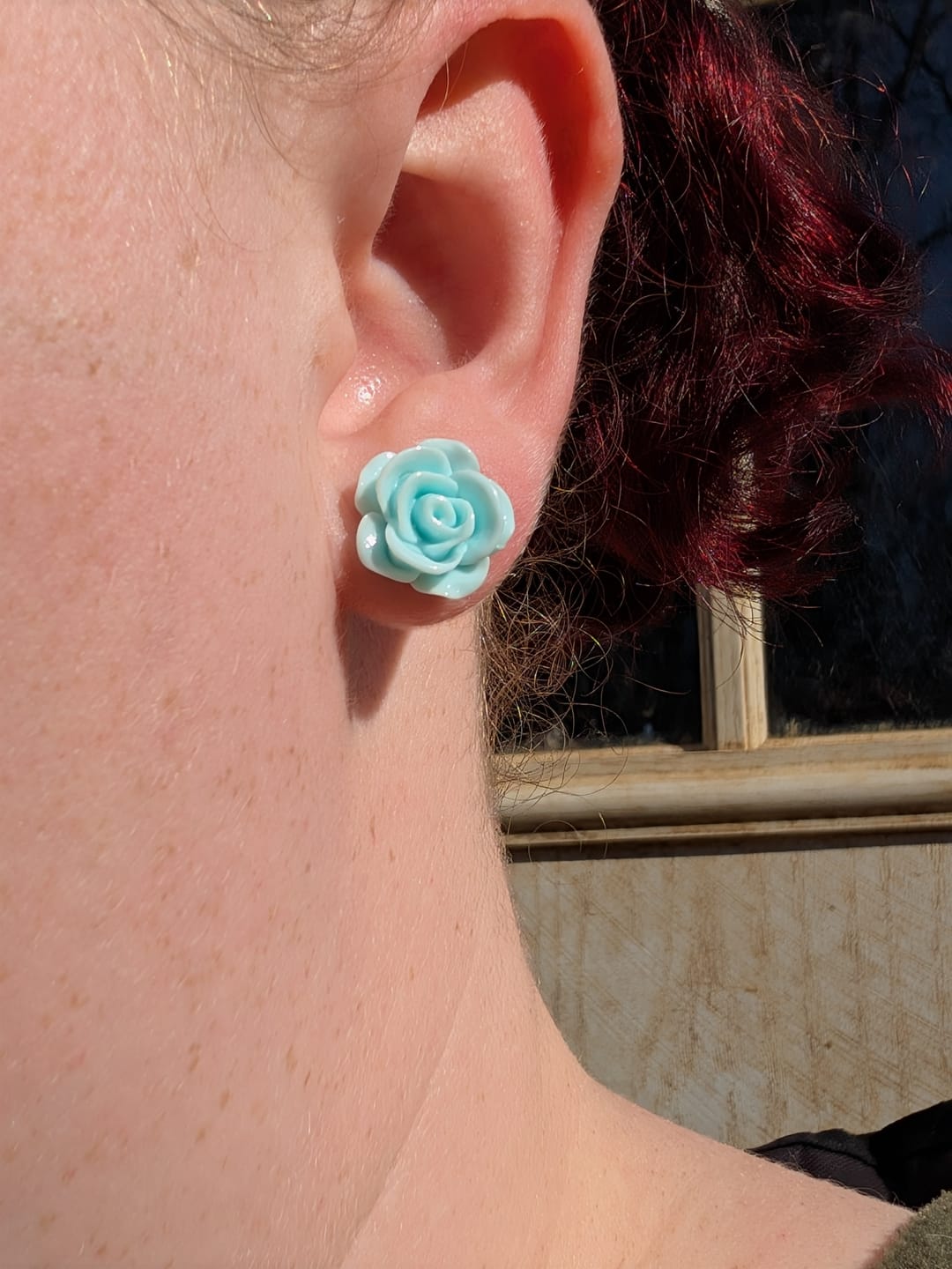 Customer photo review of Large Shiny Rose Studs Hypoallergenic Earrings for Sensitive Ears Made with Plastic Posts