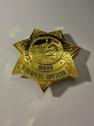 Customer photo review of US Traffic Officer CHP highway patrol Badge Replica Movie Props Customizable Number