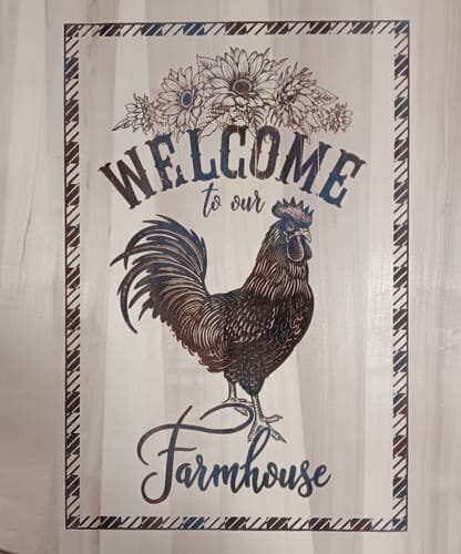 Customer's finished wooden sign made with Scorch Paint, showing a rooster and the text 'Welcome to our Farmhouse'.