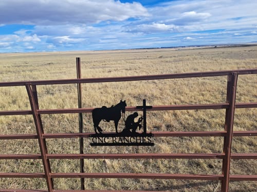 Customer photo review of Kneeling Cowboy Monogram - Steel Sign