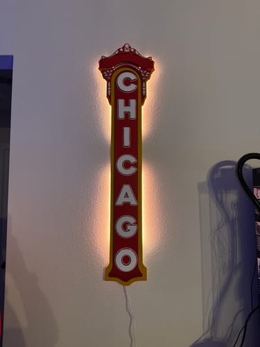 Customer's Chicago Theater wall art, mounted and glowing with the optional warm light kit.