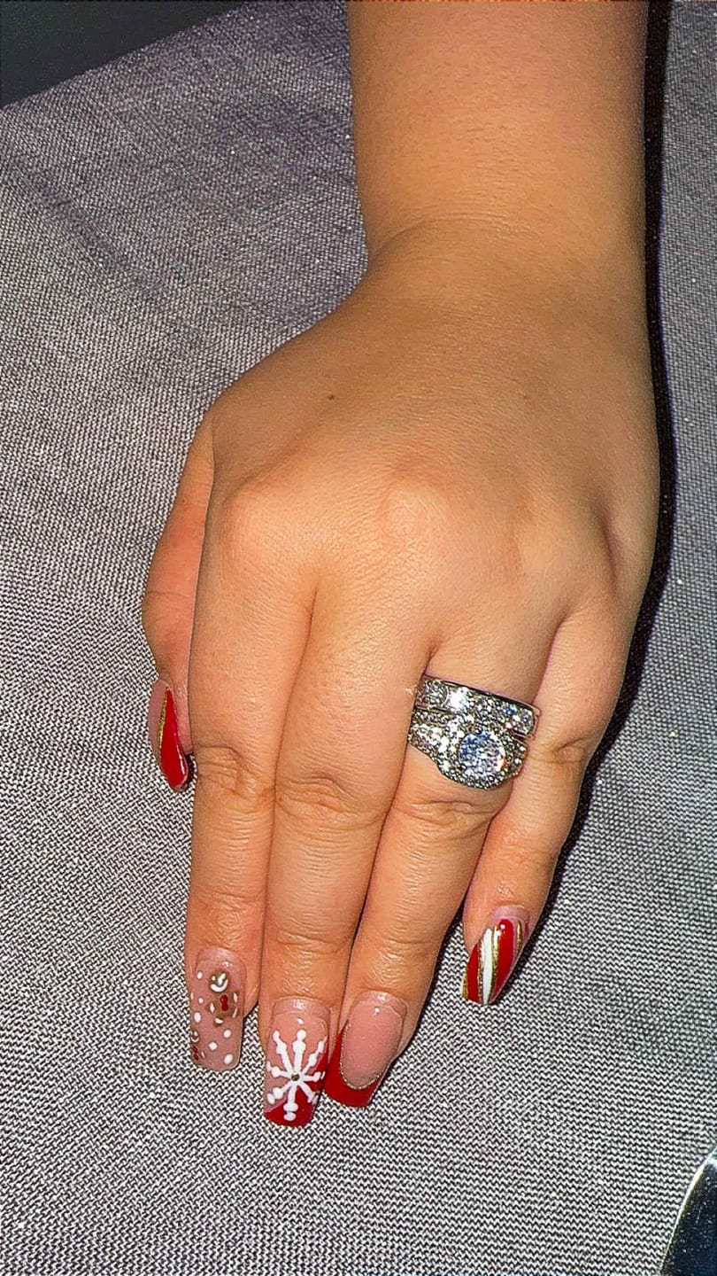 Customer photo review of 4mm Moissanite Eternity Band 925 Sterling Silver Ring