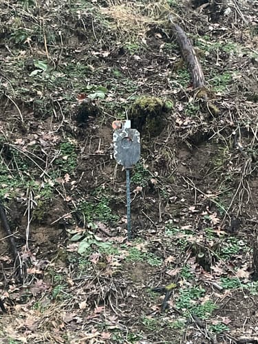 Customer photo review of AR500 Steel Hostage Target 12" x 20" x 1/2" Armored Steel Bullseye Reactive Target with 2X4 & T-Post Bracket