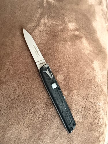 Customer photo review of Colt II Button Folding Knife 440C Blade