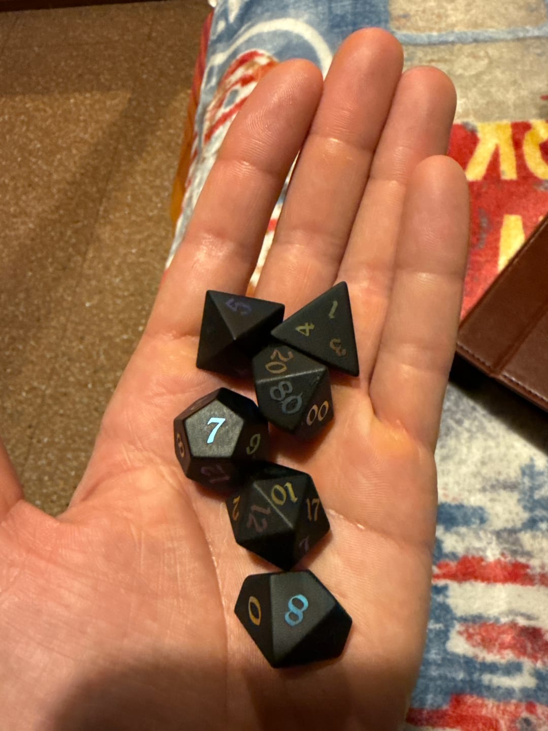 Customer photo review of Inked Black Night Raised Obsidian Hand Carved Dice DND Set