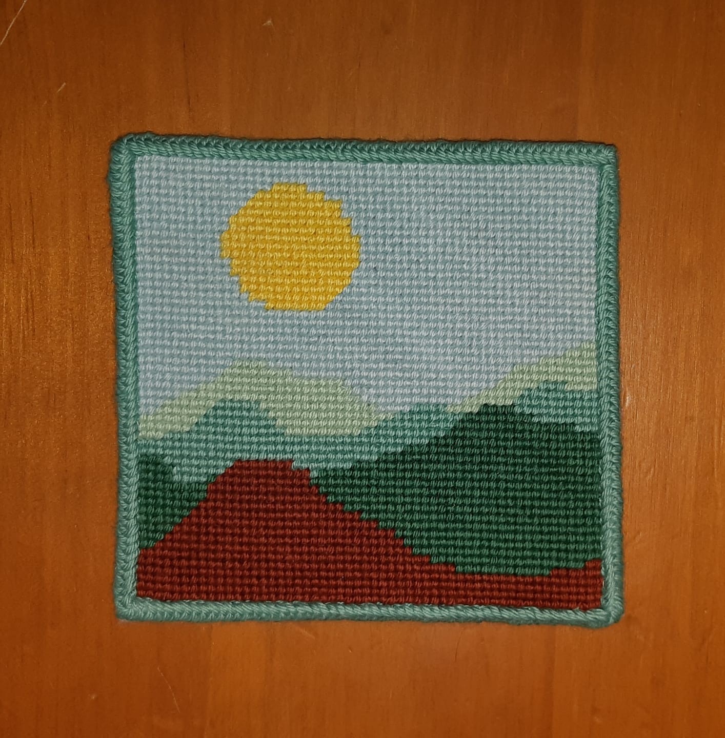 Customer photo review of Green Mountains Coaster Needlepoint Kit
