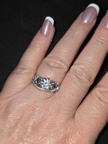 Customer photo review of Classic Three Stone Round Cut Moissanite Engagement Ring