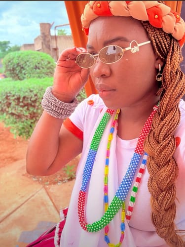 Customer photo review of Muse Logo Sunglasses – Gold Edition