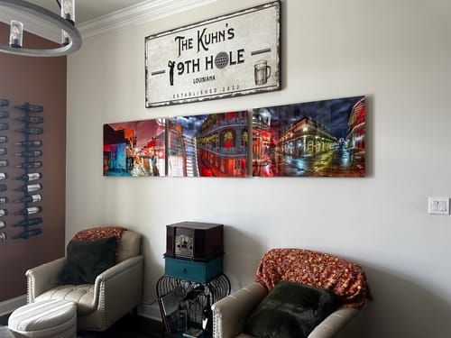 Customer's personalized 19th Hole Golf Sign mounted on a wall in their elegant wine room.