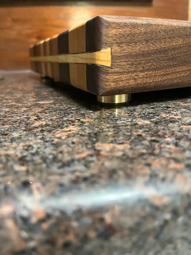 Customer photo review of Premium Cutting Board Feet - Brass/Stainless Steel